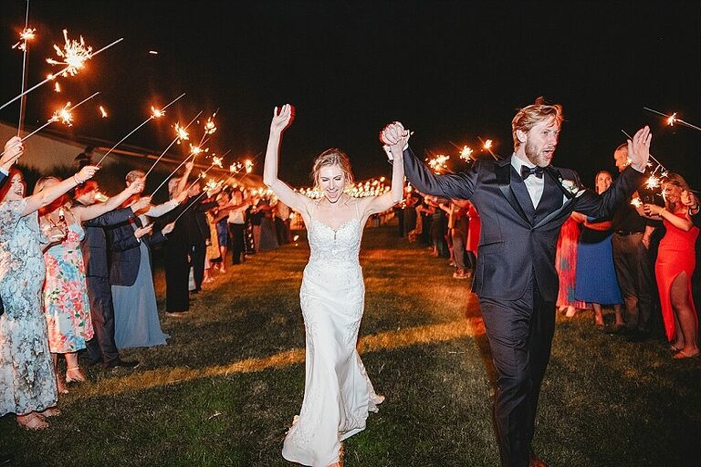 sparkler exit to boat send off at Herrington on the Bay Annapolis  wedding Waterfront venue