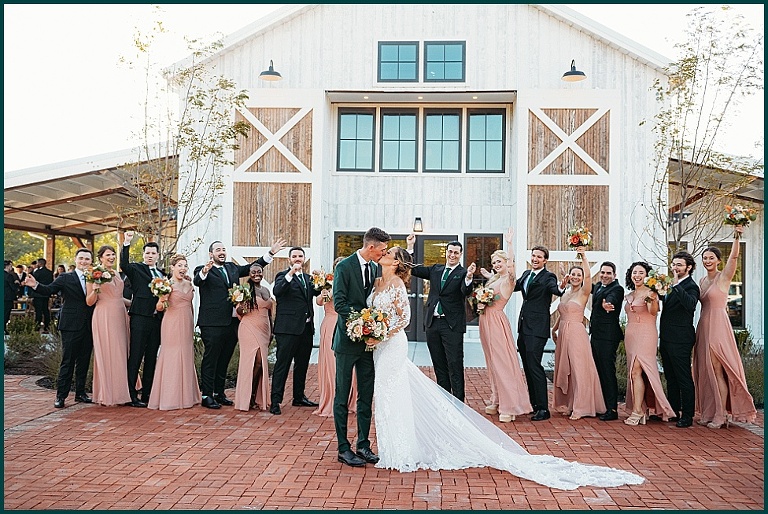 Annapolis waterfront wedding bridesmaids with  blush dresses, rustic barn venue
