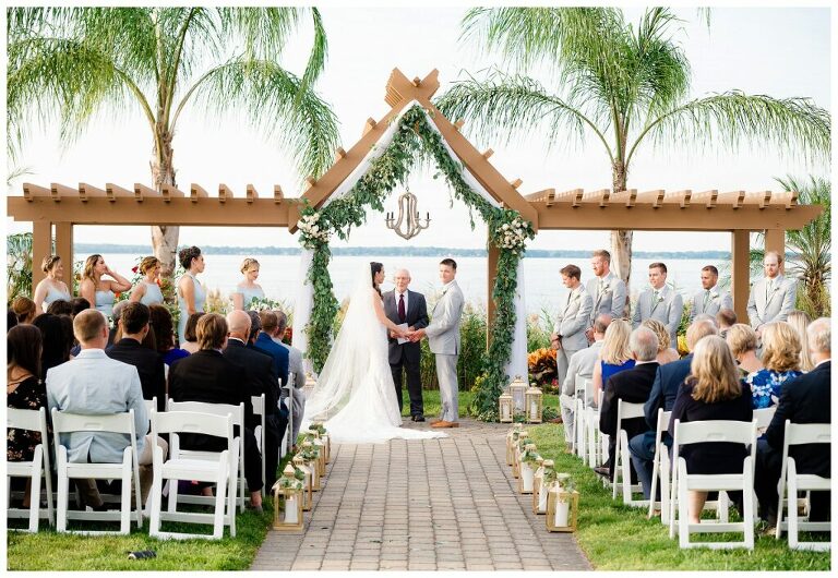 palm trees Maryland Waterfront wedding chandelier and pergola in Annapolis