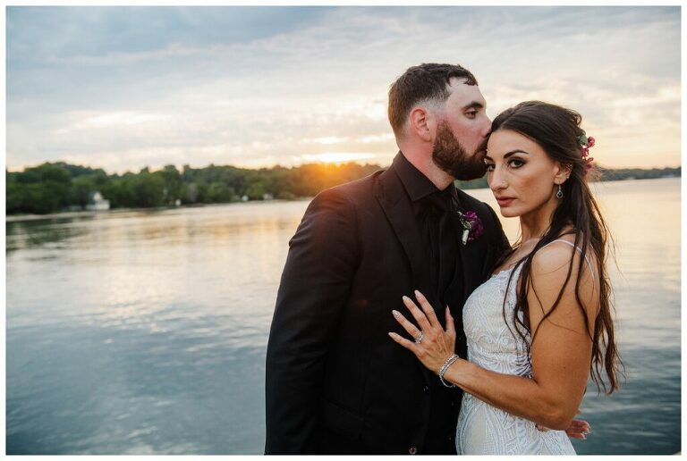 Maryland couple with black suit black shirt and wedding dress at Herrington on the Bay Annapolis Waterfront wedding