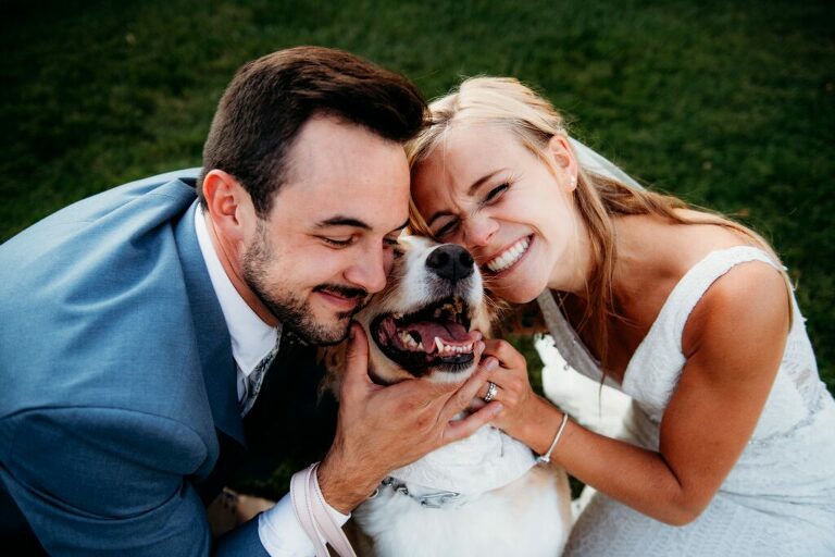 dogs at wedding at Herrington on the Bay dog wedding photo smiling at Annapolis waterfront wedding